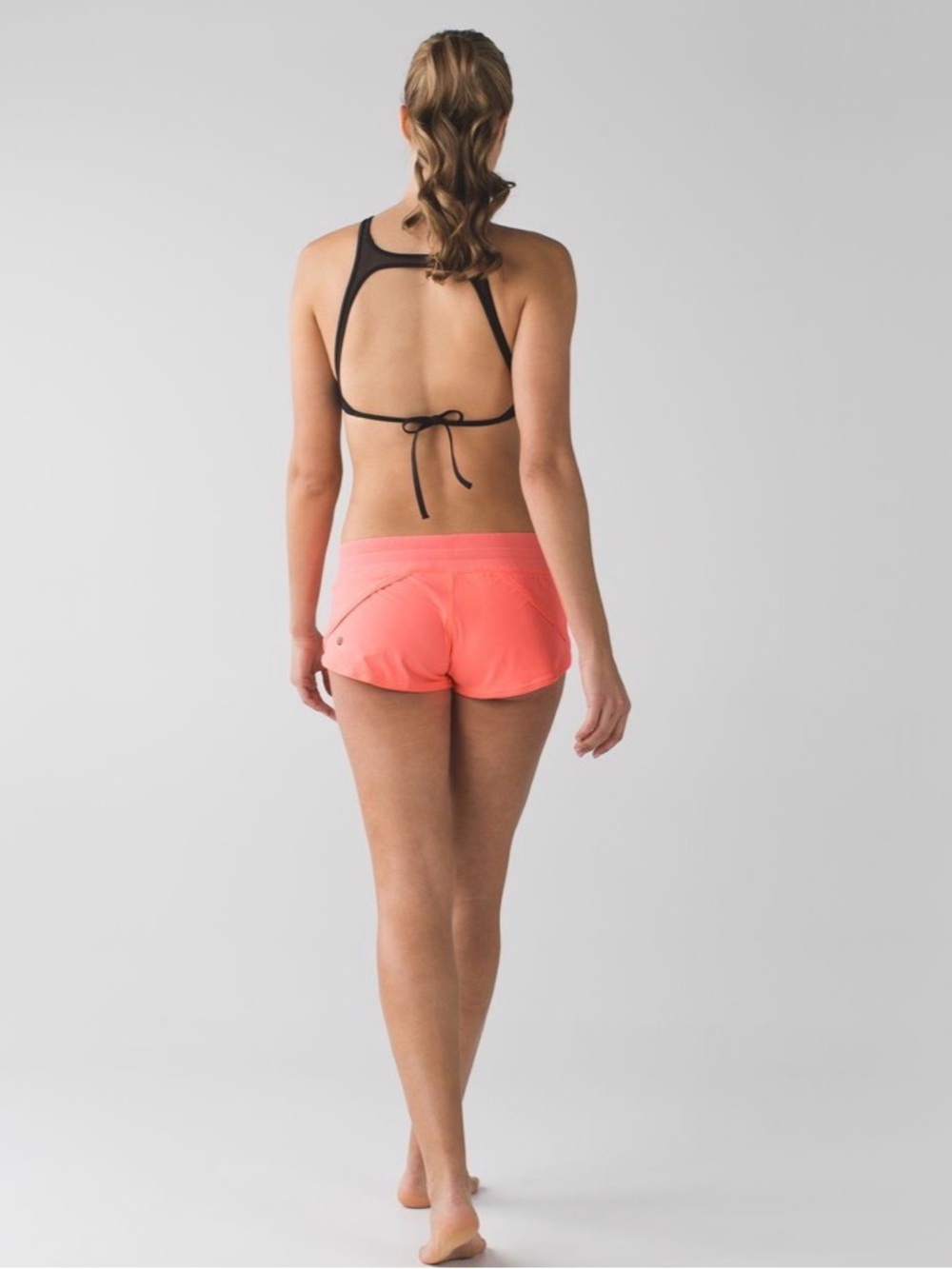 Reversible Lululemon Athletica Coral/heathered grey “Surf Shorts”.